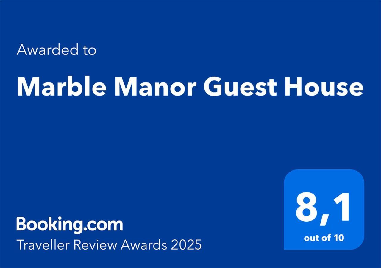 Marble Manor Guest House Лос Алказарес Экстерьер фото